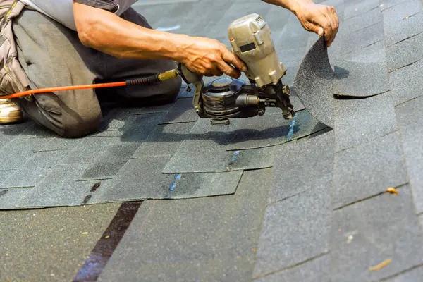 Choosing Between Asphalt, Metal, and Tile for Roof Replacement